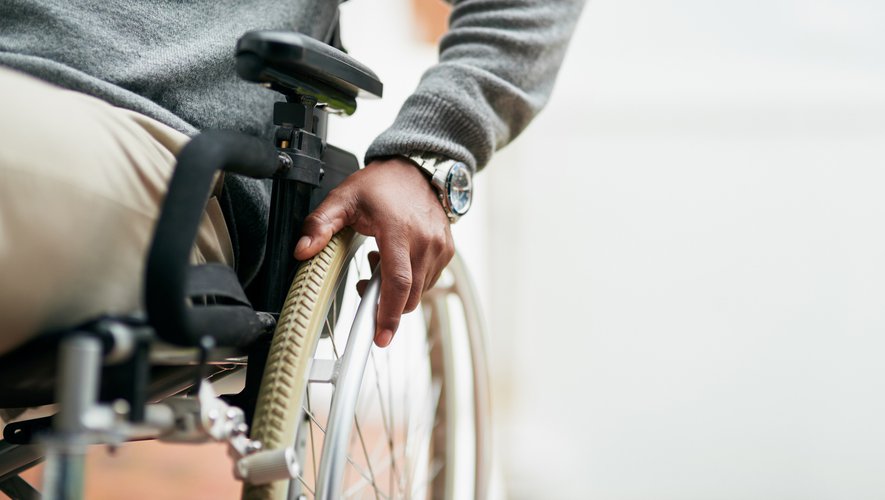 Cropped Shot Of An Unrecognizable Senior Man Sitting In His Wheelchair At Home